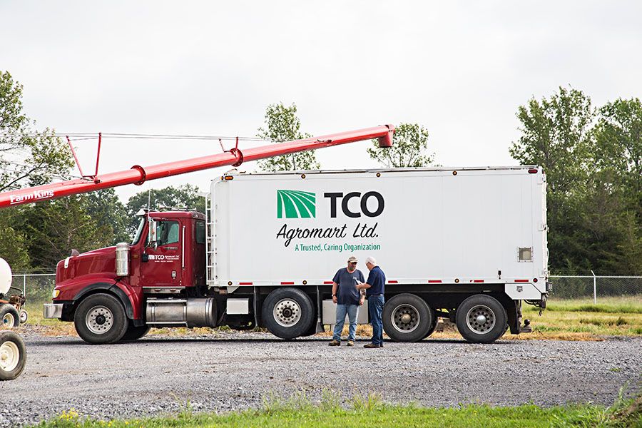 TCO Agromart Ltd. Workers by Truck